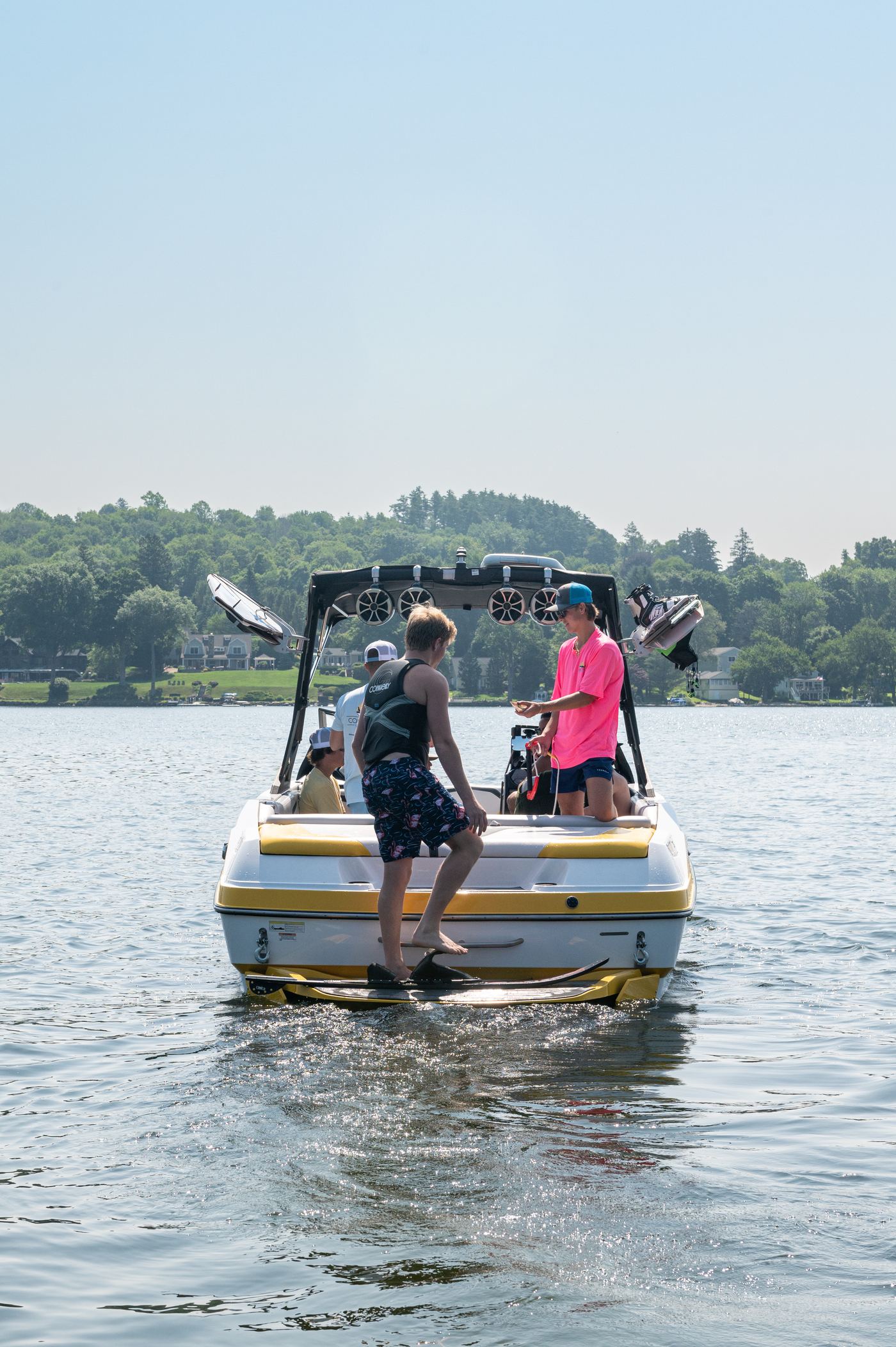 A clean pontoon ready at the dock &mdash; the boat you never have to winterize, shrink-wrap, or haul out yourself
