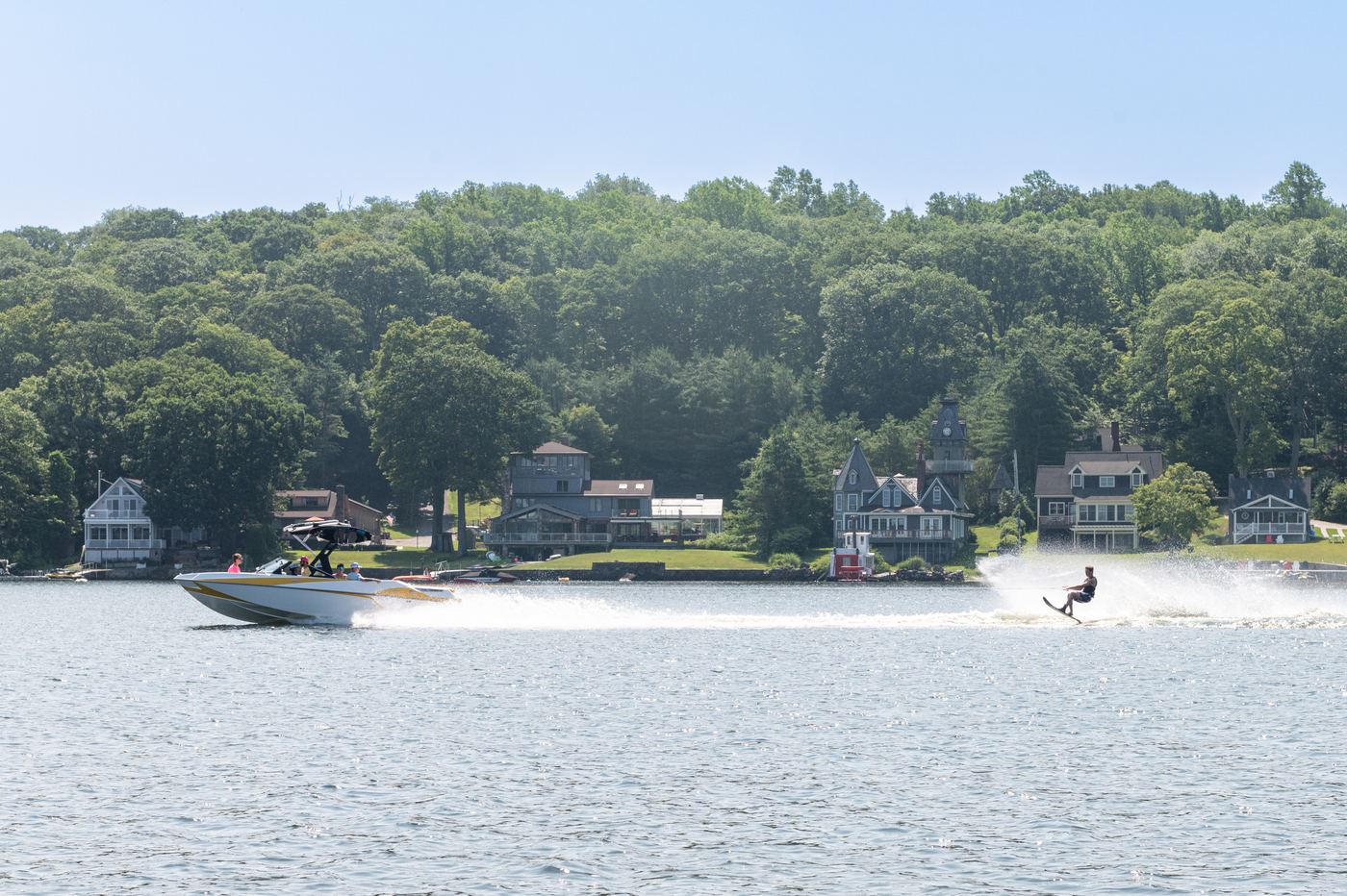 Waterskier carving across Lake Lillinonah